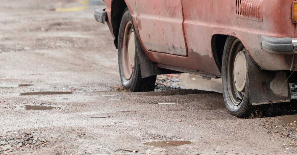 Car Crash Caused by Bad Roads